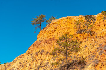 Mount on the beach of Praia do Barranco das Belharucas, Albufeira, Algarve. Portugal