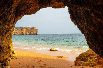Natural cave in the Algarve on the beach at Praia da Coelha, Albufeira. Portugal