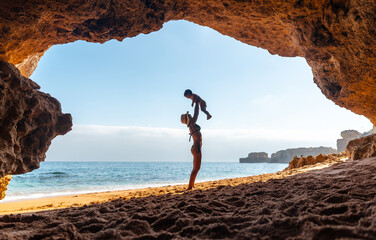 With the son in the natural beach cave in the Algarve at Praia da Coelha, Albufeira. Portugal