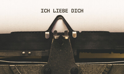 German word Ich liebe dich (I love you)Vintage type writer from 1920s