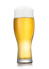 Lager beer in long glass with bubbles and foam on white background.