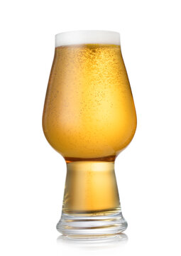 Glass of lager ipa craft preium beer with foam on white background.
