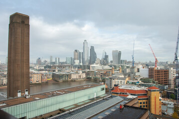 View of London City skyline and River Thames with the Chimney of Tate Modern on the left in London, England, UK