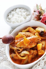 Asian food, homemade Chicken and onion red curry with rice