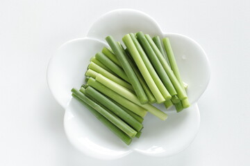 Prepared Chinese vegetable, garlic sprouts on white plate