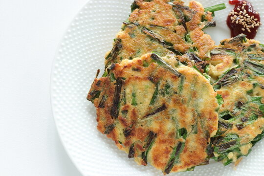 Korean food, leek and tofu Jeon Pancake on dish with copy space for nutrition cooking image