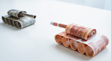 tank made of dollar bills rides on a road made of ruble bills.
