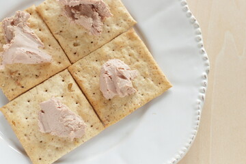 Foie gras paste on biscuits for gourmet appetizer 
