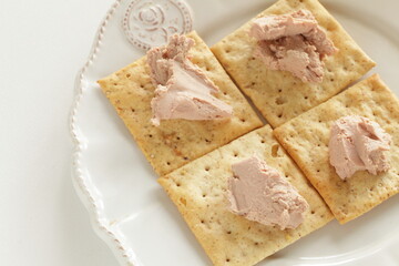 Foie gras paste on biscuits for gourmet appetizer 