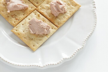 Foie gras paste on biscuits for gourmet appetizer 