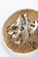 Japanese Maitake mushroom on bamboo basket for cooking ingredient