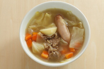 sausage and beef in vegetable soup, for comfort food image