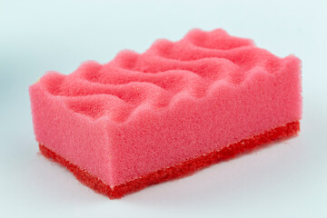 Obraz na płótnie Canvas Red foam sponge for washing dishes