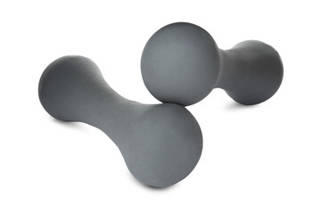 Grey dumbbells on white background. Weight training equipment