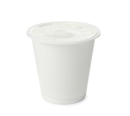 Delicious organic yogurt in plastic cup isolated on white