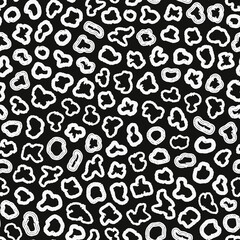 Monochrome abstract irregular circles seamless repeat pattern. Random placed, vector geometrical elements all over print in black and white.