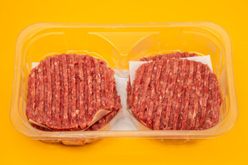 fresh raw minced meat in plastic box