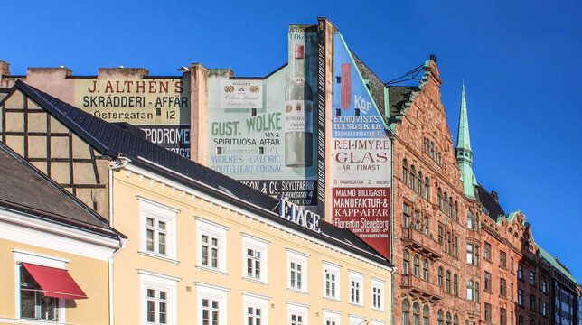 Malmö, Sweden - July 25, 2022: Apoteket Lejonet on stortorget square, oldest pharmacy in Sweden and painted advertising