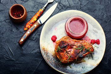 Fried steak with raspberry sauce