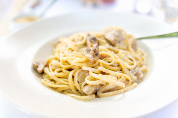 Creamy mushroom Spaghetti pasta, Vegan option, served in restaurant