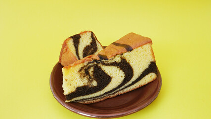 A small plate of delicious chocolate sponge bread