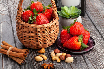strawberry in a basket on wood background