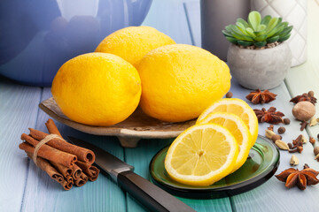 sliced lemon on wood background