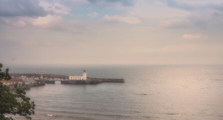 Obraz premium Lighthouse and sea mist.
