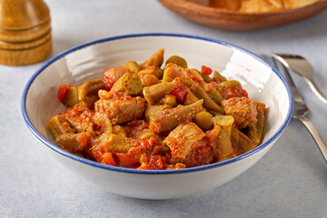 Homemade okra stew in bowl. Closeup