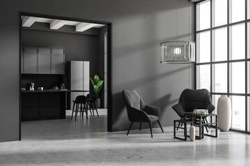 Grey kitchen interior with armchairs and coffee table, panoramic window