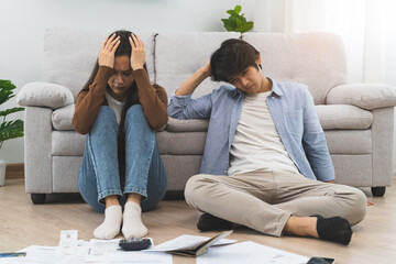 Family financial concept, Stressed wife and husband have a problem to pay loan can not pay credit card debt.