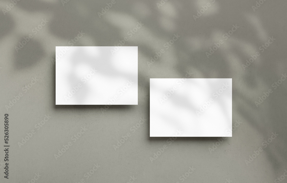 Poster postcard mockup empty double sided template with overlay shadow on a textured background. blank pape