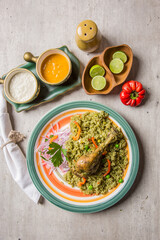 Arroz con pollo chicken leg green rice peru peruvian gourmet restaurant popular comfort food