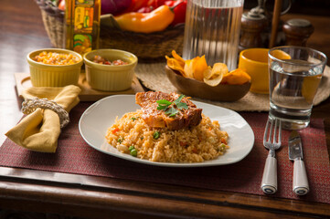 Fried Vegetable rice with fried pork chop peru peruvian gourmet restaurant popular comfort food