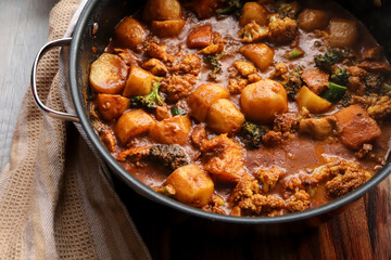 stew with vegetables. Vegetable curried stew with broccy, caulyand pumpkin. Mild curry
