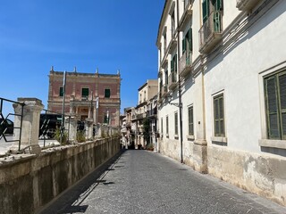 Fototapeta na wymiar A street in Ortygia, historic part of Syracuse, Sicily