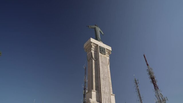 Statue of Christ and Monastery on mountain top of Mirador Cim del Toro, Es Mercadal, Menorca, Balearic Islands