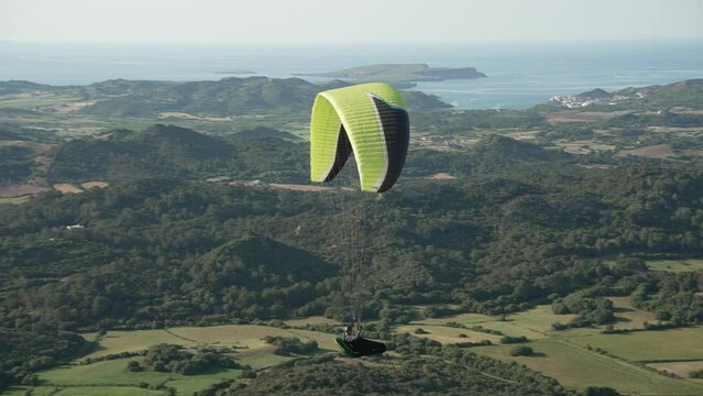 Paraglider from mountain top of Mirador Cim del Toro, Es Mercadal, Menorca, Balearic Islands