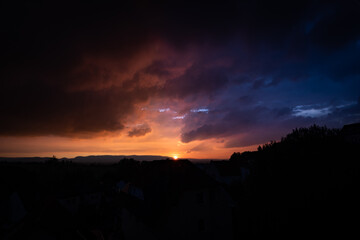 orange purple blue sunset over the mountains