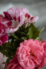 cute bouquet compliment closeup in pink colors, roses and pink flowers