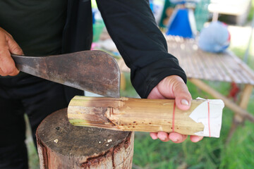 Glutinous rice roasted in bamboo joints, Thai dessert.