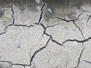 Obraz premium dry gray earth with cracks