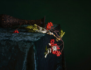 Branch with red rowan berries. Still life. Vintage.