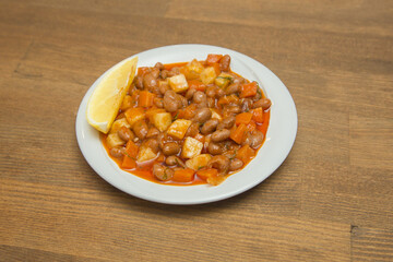 Traditional delicious Turkish food; Kidney beans with olive oil, Red kidney bean stew, Turkish name; Barbunya pilaki stock photo
Bean, Black Color, Bowl, Brown, Close-up