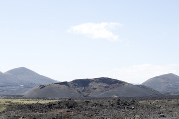 Fototapeta na wymiar Volcanos in Timanfaya National Park on Lanzarote, Canary Islands, Spain