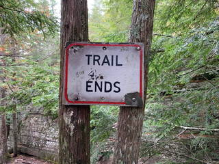 Trail ends sign in the woods