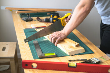Home workshop. Preparation of material for the manufacture of shelves for home and garden