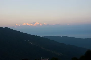Photo sur Plexiglas Kangchenjunga Kangchenjunga, also spelled Kanchenjunga and Khangchendzonga, is the third highest mountain in the world.