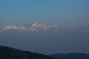 Photo sur Plexiglas Kangchenjunga Kangchenjunga, également orthographié Kanchenjunga et Khangchendzonga, est la troisième plus haute montagne du monde.