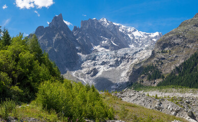 Fototapeta na wymiar The Mont Blanc massif and Brenva glacier from Val Ferret valley - Entreves in Italy.